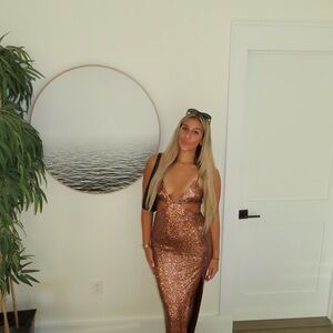 Sparkling Bronze gowned with side cut outs